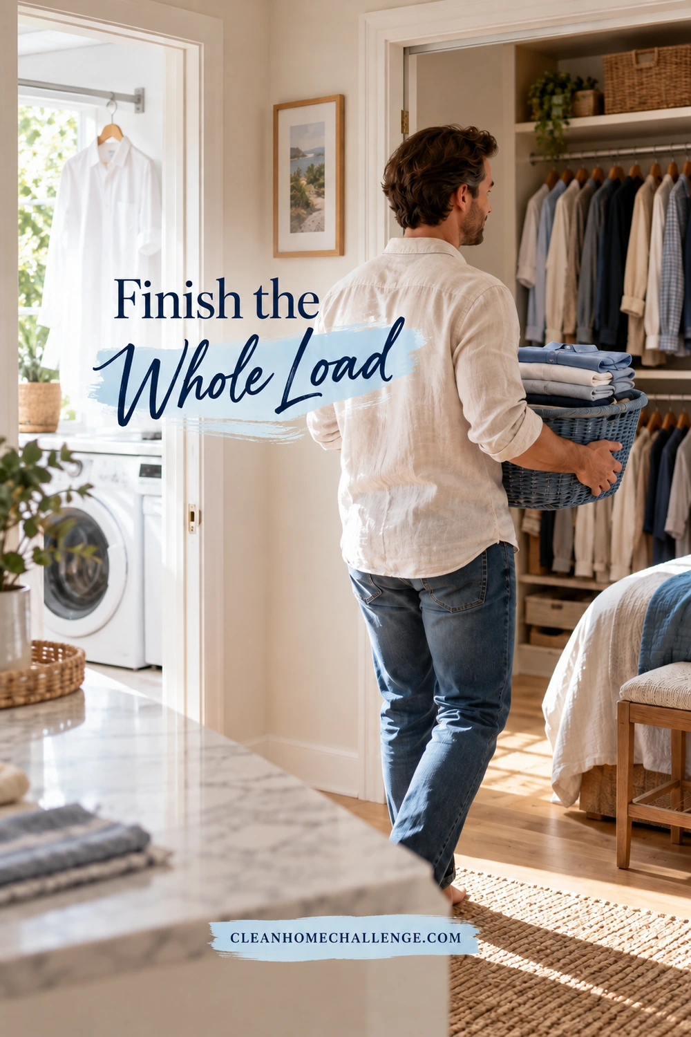 A man carries a small basket of folded laundry through a doorway toward a wardrobe, with a washer and an air-drying shirt visible behind him.