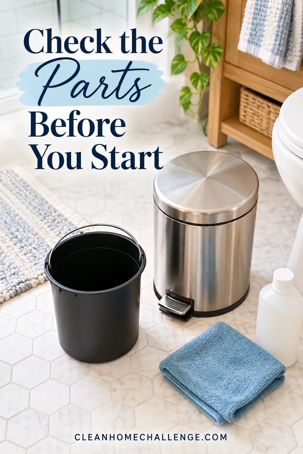 A stainless steel pedal trash can, separate black bucket, blue cloth, and plain bottle stand on bathroom tiles.