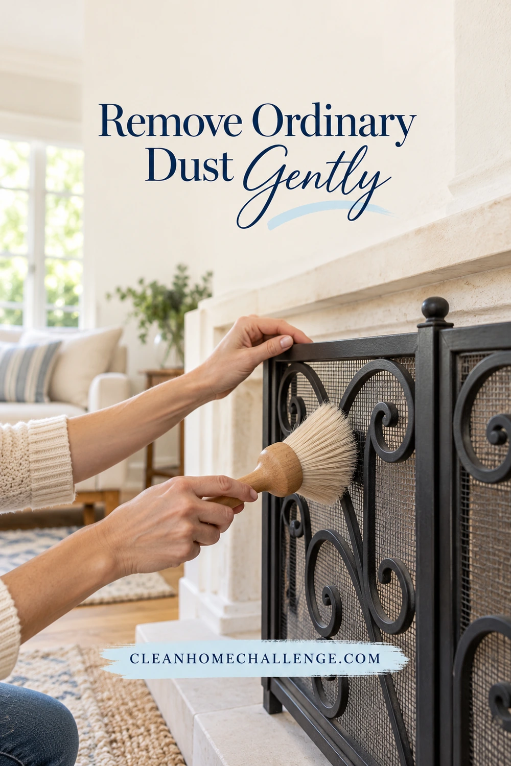 Closeup soft natural-bristle brush gently dusting screen ornament while hand steadies frame