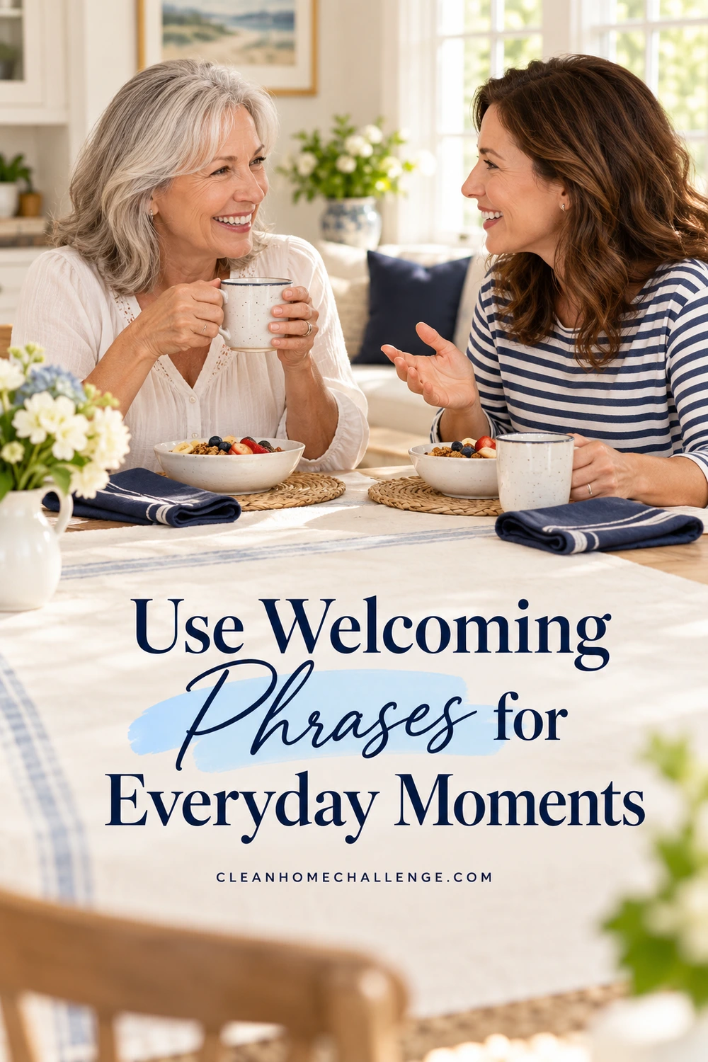 Two women talk over breakfast bowls and mugs at a family dining table.
