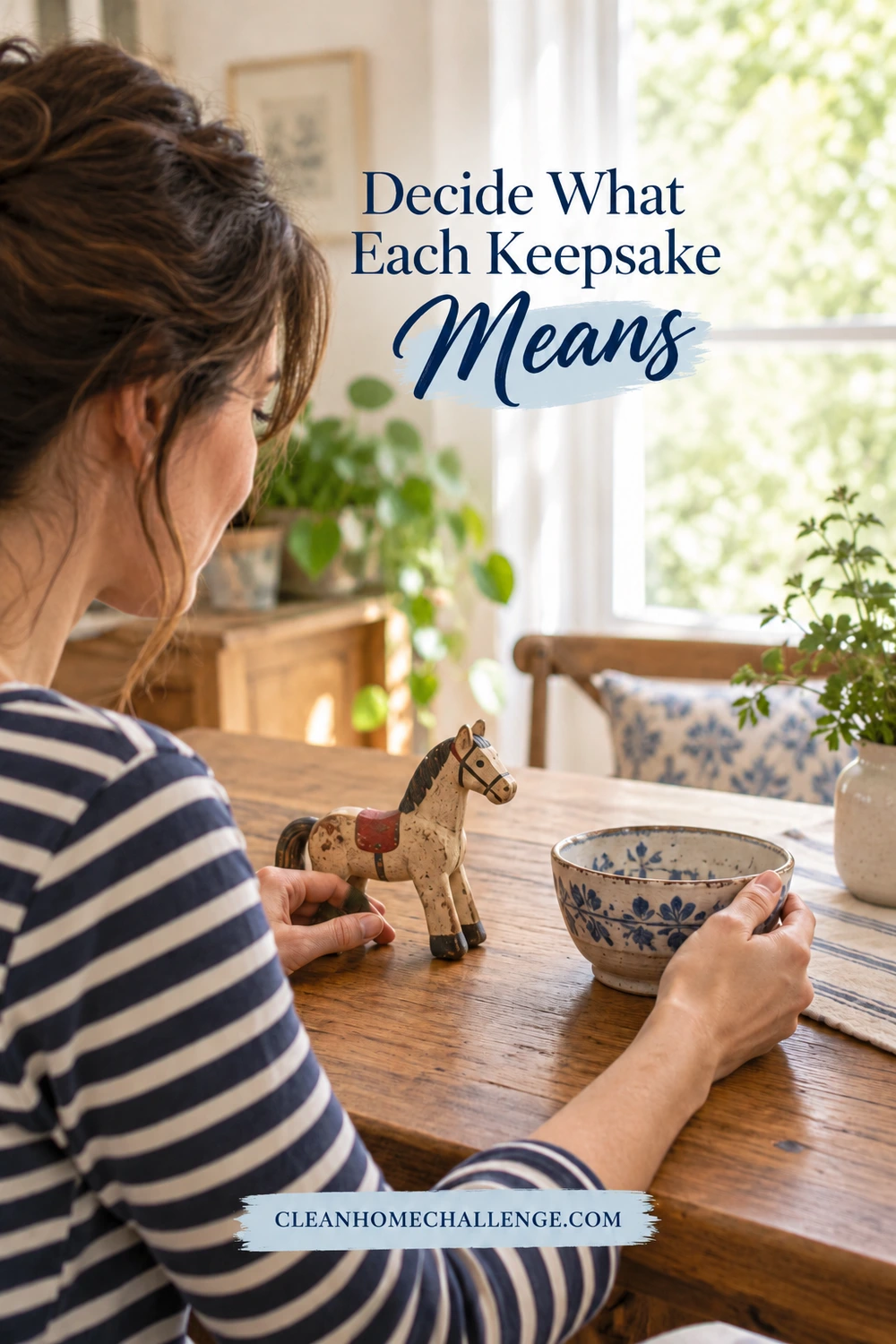 Seen over her shoulder, a woman in a striped shirt considers a wooden toy horse and a blue-and-white ceramic bowl on a table.